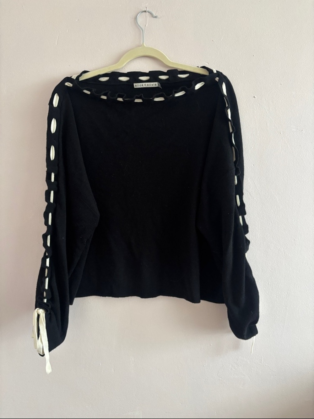 Alice + Olivia Black Off-the-Shoulder Sweater with White Lace-Up Trim